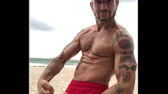 FLEXING AT THE BEACH Thumb